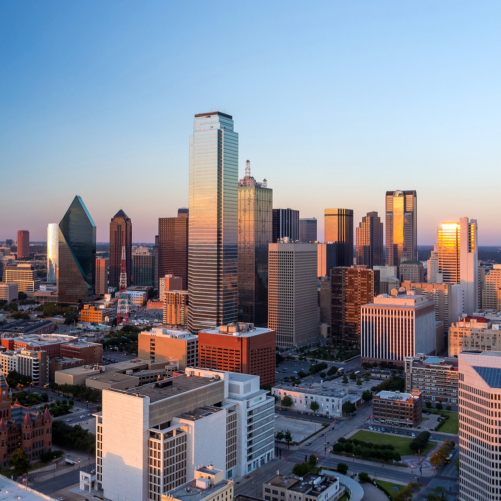 Dallas,,Texas,Cityscape,With,Blue,Sky,At,Sunset,,Texas